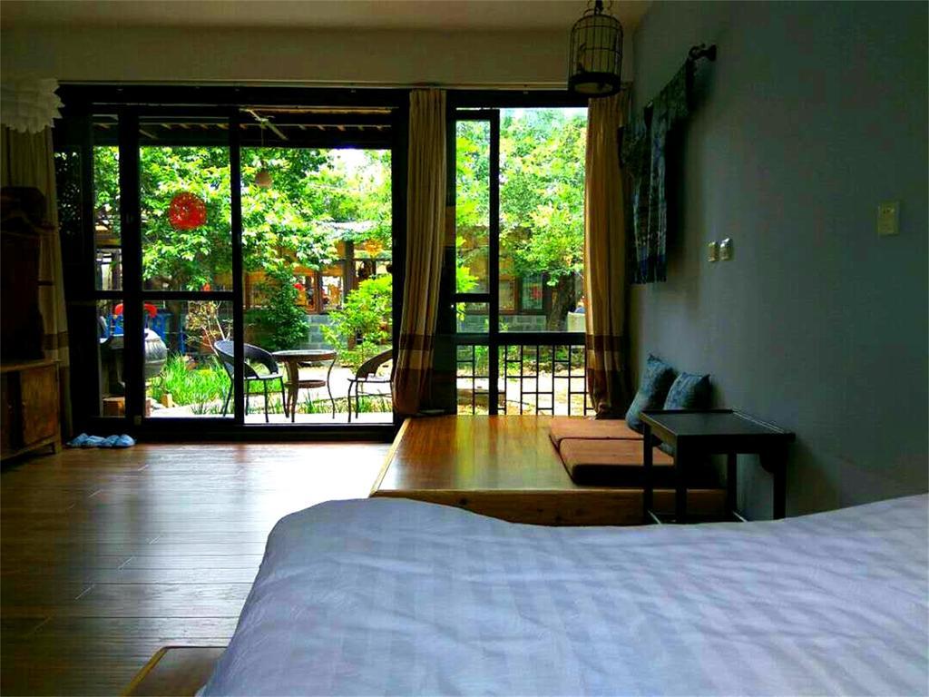 Lijiang Baisha Free Time Designed Hotel Extérieur photo